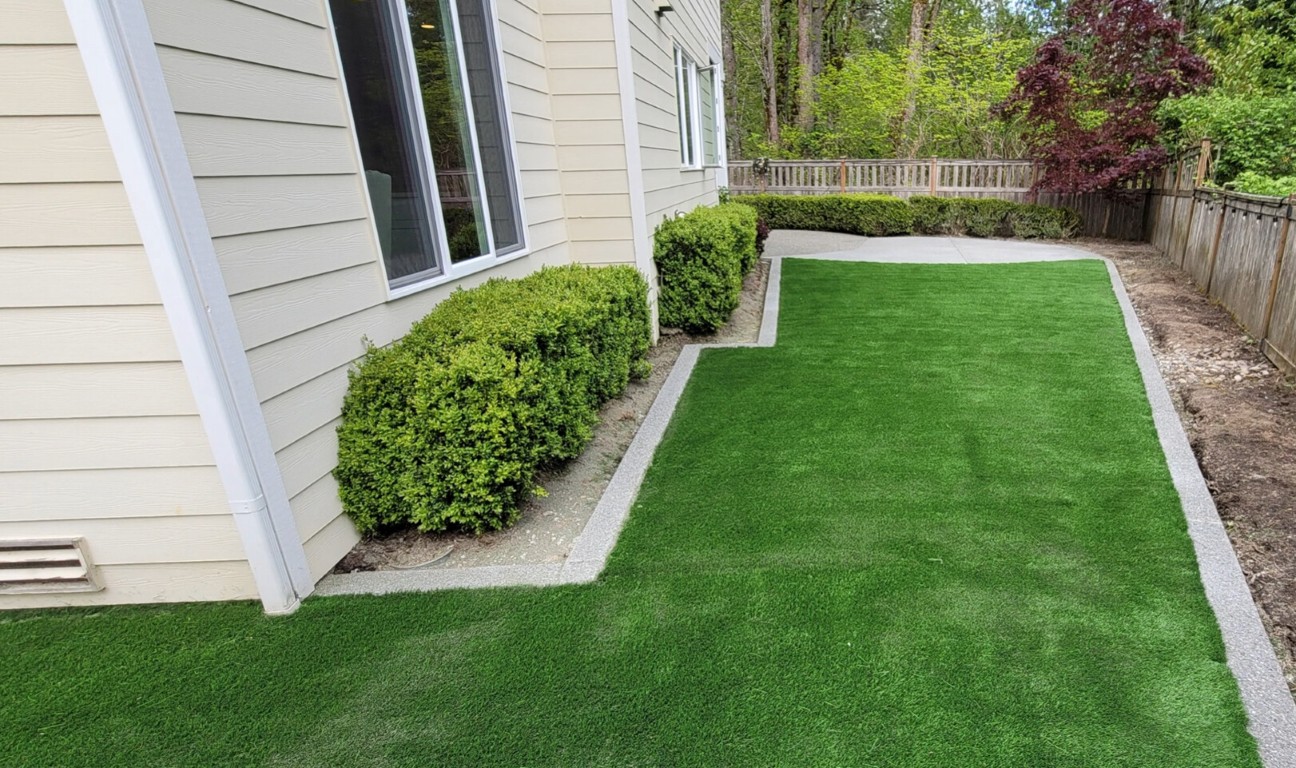Professional artificial grass installation in Trenton, NJ backyard